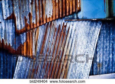 Picture - Rusty sheet metal near window. Fotosearch