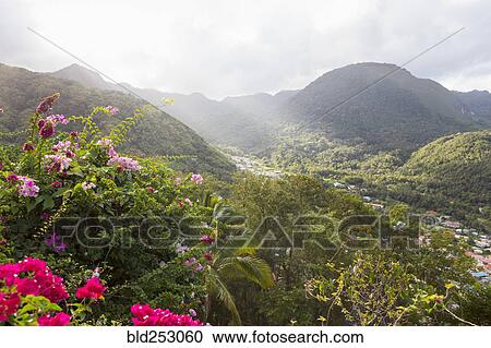 Scenic view of valley and mountains View Large Photo Image Stock Image - Scenic view of valley and mountains. Fotosearch