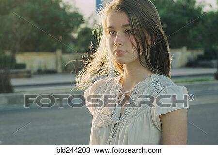 Serious Caucasian woman outdoors View Large Photo Image Stock Image - Serious Caucasian woman outdoors. Fotosearch