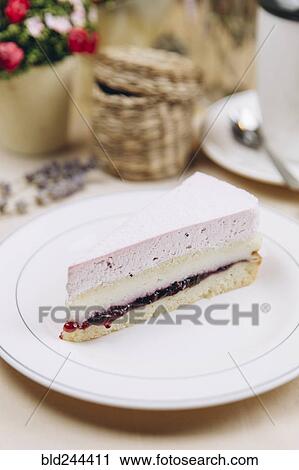 Slice of blackcurrant cheesecake on plate View Large Photo Image Stock Image - Slice of blackcurrant cheesecake on plate. Fotosearch
