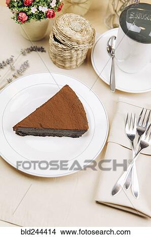 Picture - Slice of chocolate cake on plate. Fotosearch
