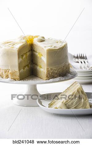 Slice of coconut cream cake on plate View Large Photo Image Stock Photo - Slice of coconut cream cake on plate. Fotosearch
