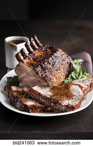 Sliced rack of pork on plate View Large Photo Image Stock Image - Sliced rack of pork on plate. Fotosearch