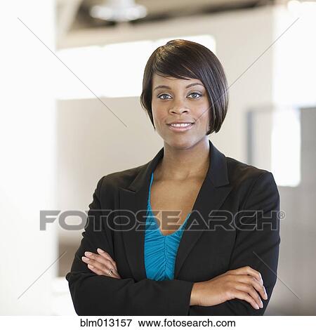Smiling African American businesswoman View Large Photo Image Stock Photo - Smiling African American businesswoman. Fotosearch