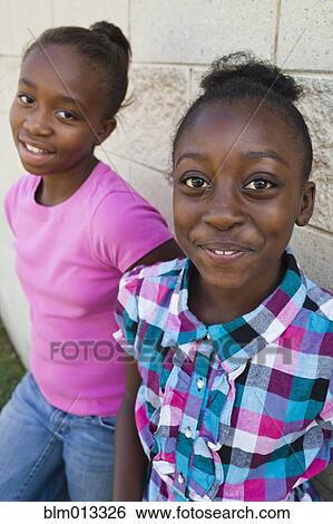 Stock Photograph - Smiling Black girls. Fotosearch