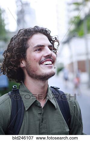 man carrying backpack