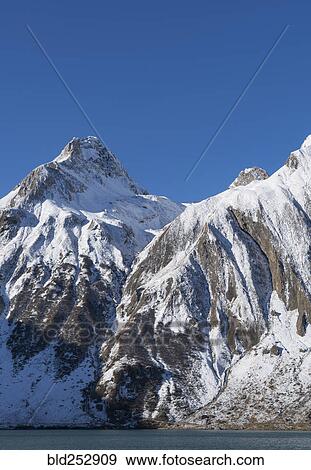 Stock Photo - Snow on mountain range. Fotosearch