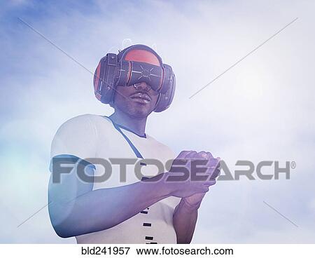 Strong man wearing virtual reality helmet View Large Photo Image Stock Photo - Strong man wearing virtual reality helmet. Fotosearch