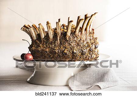 Stuffed lamb crown roast on tray View Large Photo Image Stock Photo - Stuffed lamb crown roast on tray. Fotosearch