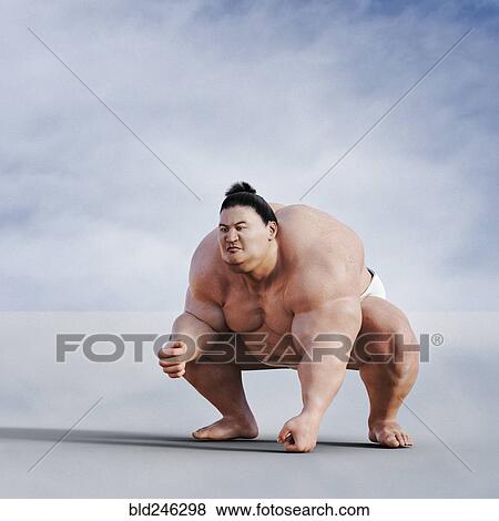 Sumo wrestler crouching View Large Photo Image Stock Photo - Sumo wrestler crouching. Fotosearch