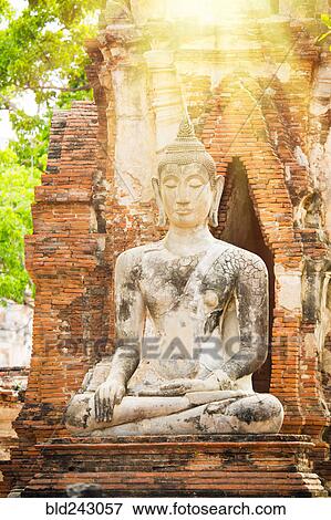 "Sunbeams on Buddha statue, Ayutthaya, Thailand" View Large Photo Image Stock Photo - "Sunbeams on Buddha statue, Ayutthaya, Thailand". Fotosearch