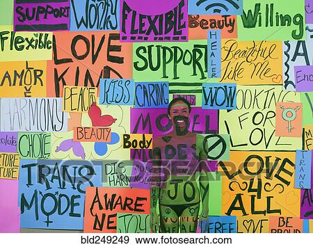 Thai transgender woman blending with message collage on wall View Large Photo Image Stock Photo - Thai transgender woman blending with message collage on wall. Fotosearch