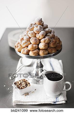 Tray of cream puffs View Large Photo Image Stock Photo - Tray of cream puffs. Fotosearch