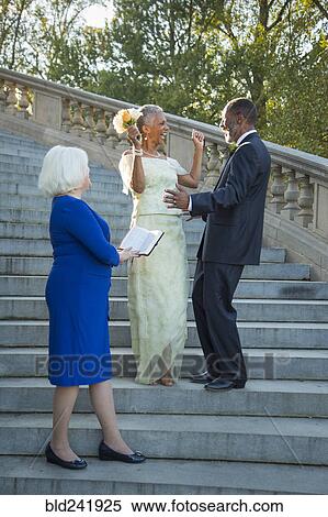 Stock Photography - Wedding ceremony on stone staircase. Fotosearch