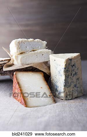Wedges of artisanal cheese View Large Photo Image Stock Photo - Wedges of artisanal cheese. Fotosearch