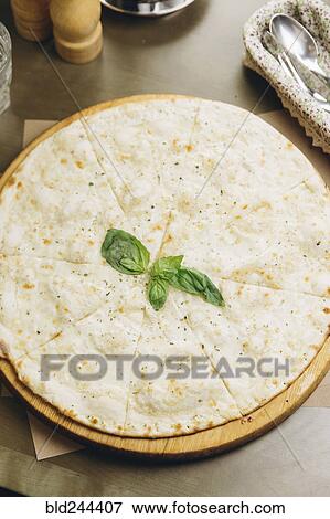 White pizza with basil View Large Photo Image Stock Photo - White pizza with basil. Fotosearch