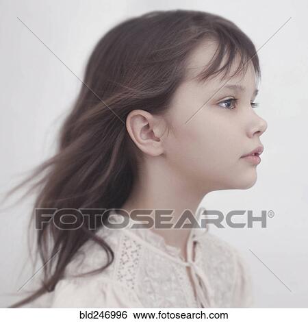 Wind blowing hair of Caucasian girl View Large Photo Image Stock Photograph - Wind blowing hair of Caucasian girl. Fotosearch