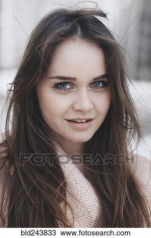 Stock Image - Wind blowing hair of Caucasian woman. Fotosearch