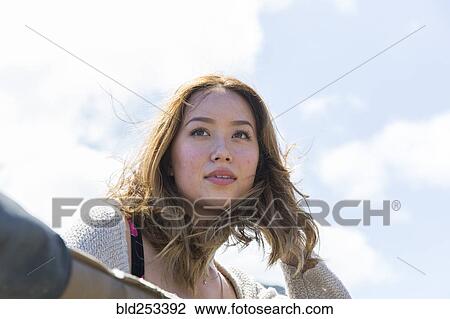 Wind Blowing Hair Of Mixed Race Woman Stock Image Bld253392