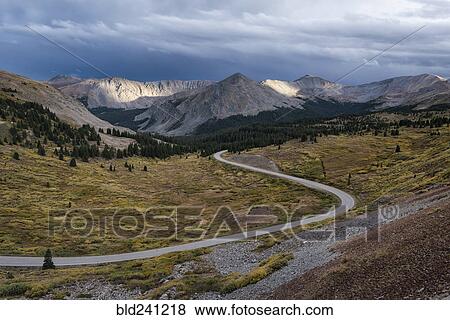 Stock Photo - Winding road in valley. Fotosearch