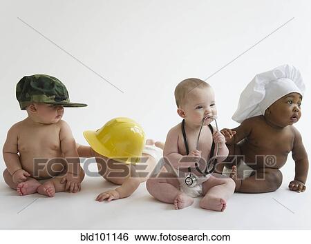 Stock Photograph - Babies in occupational hats sitting on floor together. Fotosearch