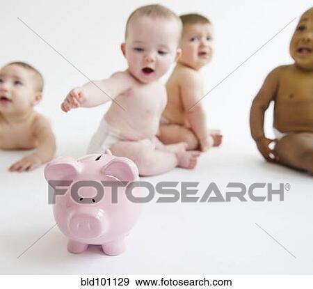 Stock Photo - Babies sitting on floor with piggy bank. Fotosearch