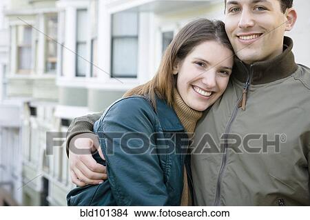 Picture - Caucasian couple hugging. Fotosearch
