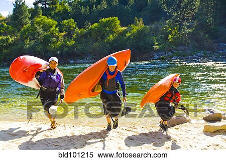 Caucasian family carrying kayaks View Large Photo Image Stock Photography - Caucasian family carrying kayaks. Fotosearch