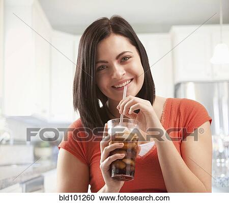 Caucasian woman drinking soda View Large Photo Image Stock Image - Caucasian woman drinking soda. Fotosearch
