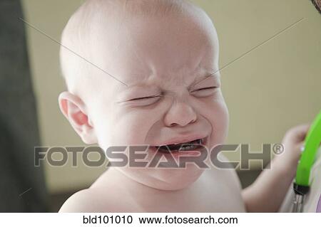Crying mixed race baby in doctor's office View Large Photo Image Stock Image - Crying mixed race baby in doctor's office. Fotosearch