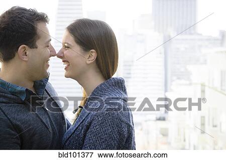 Stock Photo - Happy Caucasian couple laughing. Fotosearch