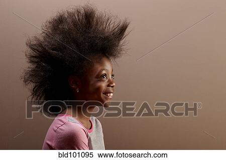 Stock Photography - Jamaican girl with unusual hair. Fotosearch