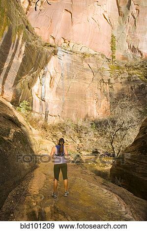 Persian woman hiking near cliff View Large Photo Image Stock Photo - Persian woman hiking near cliff. Fotosearch