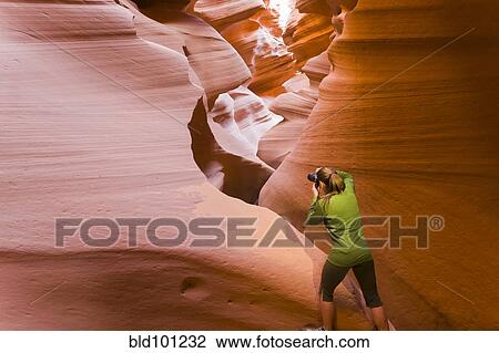 Persian woman taking photographs in canyon View Large Photo Image Stock Image - Persian woman taking photographs in canyon. Fotosearch