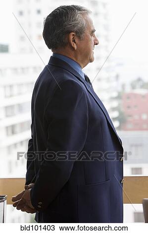 Serious Hispanic businessman View Large Photo Image Stock Image - Serious Hispanic businessman. Fotosearch
