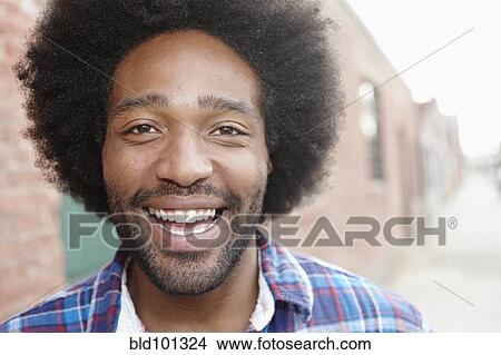 Picture - Smiling Black man. Fotosearch