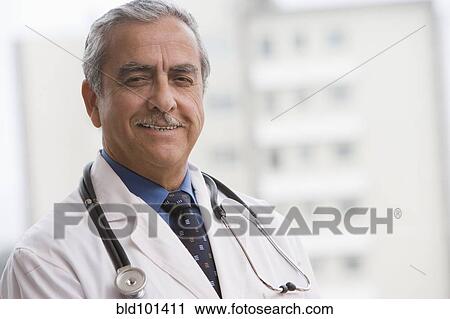 Stock Image - Smiling Hispanic doctor. Fotosearch