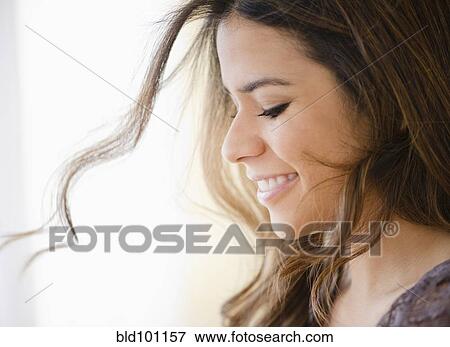 Stock Photo - Smiling Hispanic woman. Fotosearch