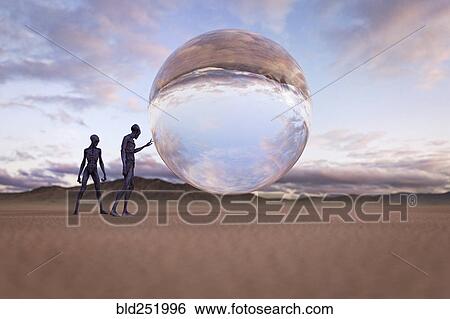 Aliens examining floating sphere in desert View Large Photo Image Stock Photograph - Aliens examining floating sphere in desert. Fotosearch