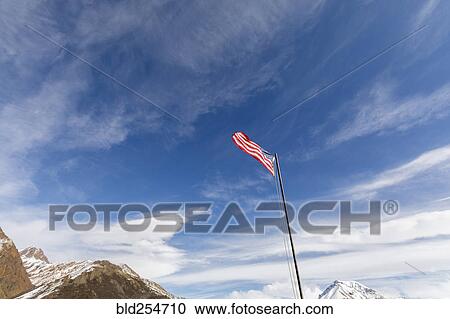 American flag near mountains View Large Photo Image Stock Image - American flag near mountains. Fotosearch