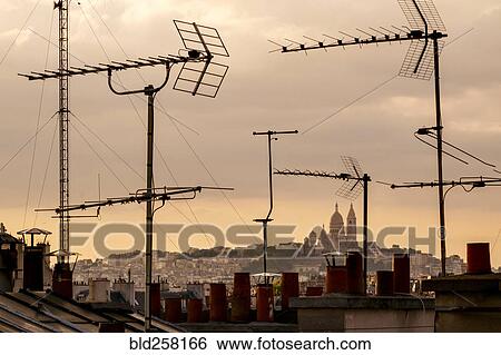 Antennas on rooftops in cityscape View Large Photo Image Stock Photograph - Antennas on rooftops in cityscape. Fotosearch