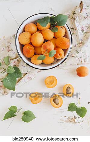 Apricots in bowl View Large Photo Image Stock Image - Apricots in bowl. Fotosearch
