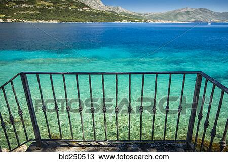 Balcony overlooking tranquil ocean View Large Photo Image Stock Image - Balcony overlooking tranquil ocean. Fotosearch