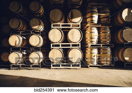 Stock Image - Barrels in distillery. Fotosearch