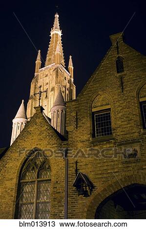 Bell tower of cathedral at night View Large Photo Image Stock Image - Bell tower of cathedral at night. Fotosearch