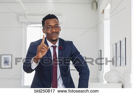 Black man gesturing in gallery View Large Photo Image Stock Photo - Black man gesturing in gallery. Fotosearch