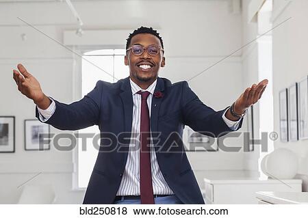 Stock Photo - Black man gesturing in gallery. Fotosearch