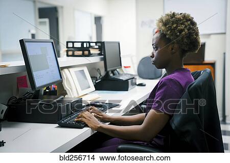Black nurse using computer View Large Photo Image Picture - Black nurse using computer. Fotosearch