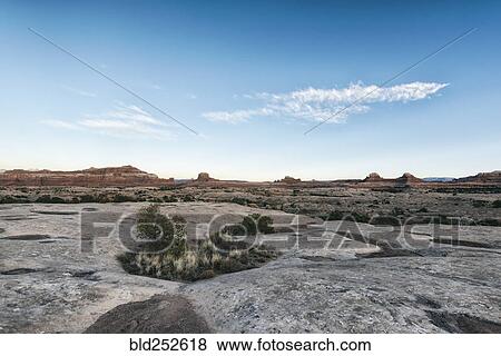 Stock Photo - "Blue sky over desert, Moab, Utah, United States". Fotosearch