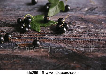 Blueberries on wooden table View Large Photo Image Stock Photography - Blueberries on wooden table. Fotosearch